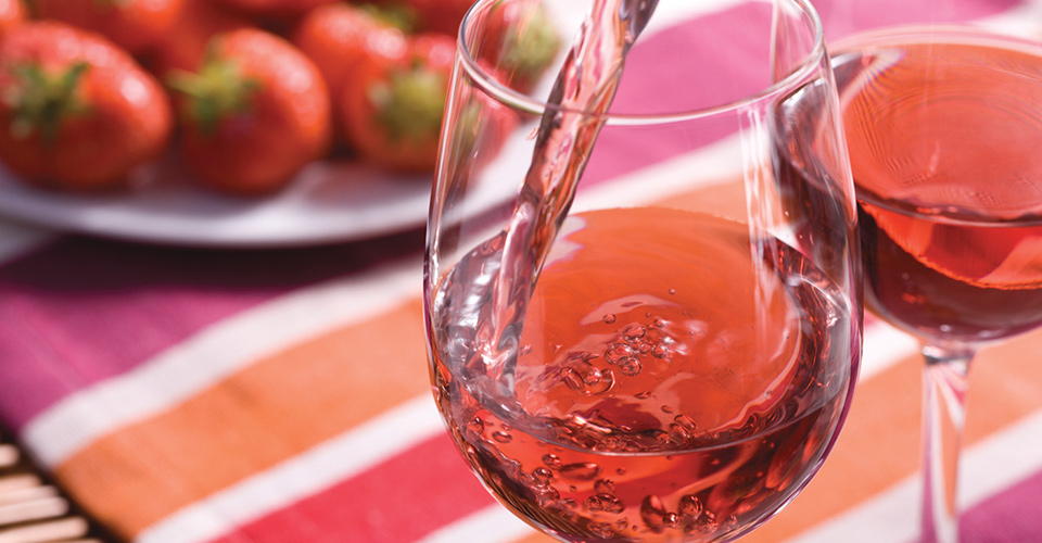 Glass of Rosé being poured