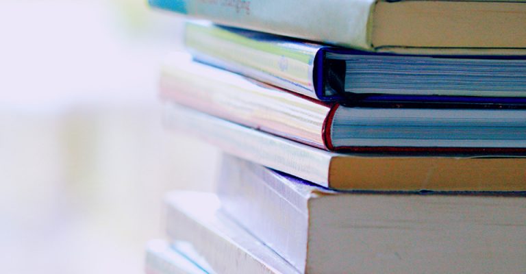 photo of stacked books.