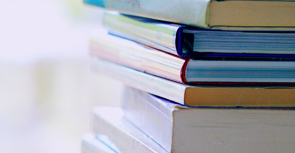 photo of stacked books.