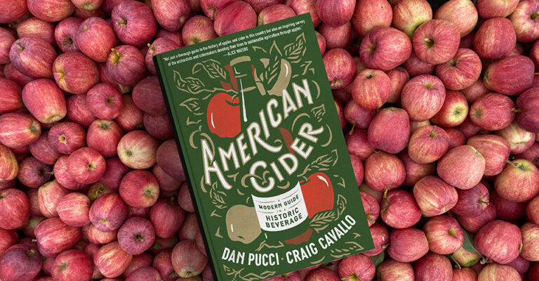 book cover on background of red apples
